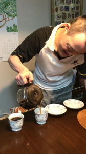 Koji making coffee